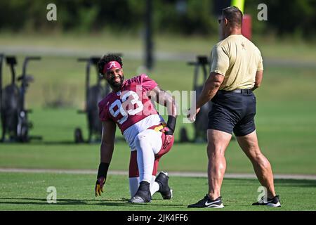 Ashburn, VA, USA. 30th July, 2022. Washington Commanders defensive tackle Jonathon Allen (93) stretches during the Washington Commanders Training Camp practice at the INOVA Sports Performance Center in Ashburn, Va. Reggie Hildred/CSM/Alamy Live News Stock Photo