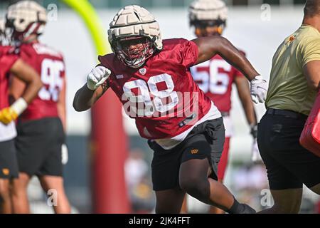 Washington Commanders defensive tackle Phidarian Mathis (98) runs a drill  during an NFL football practice at FedEx Field, Saturday, Aug. 6, 2022, in  Landover, Md. (AP Photo/Alex Brandon Stock Photo - Alamy