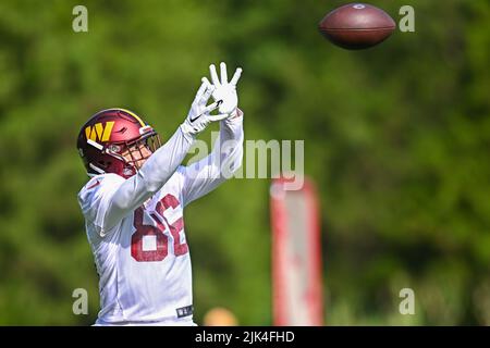 Ashburn, VA, USA. 30th July, 2022. Washington Commanders wide receiver Alex Erickson (86) catches a pass during the Washington Commanders Training Camp practice at the INOVA Sports Performance Center in Ashburn, Va. Reggie Hildred/CSM/Alamy Live News Stock Photo