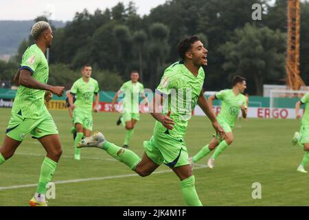 Jena, Germany. 30th July, 2022. Soccer: DFB-Pokal, FC CZ Jena - VfL Wolfsburg, 1st round, Ernst-Abbe-Sportfeld. Wolfsburg's Omar Marmoush celebrates after scoring the 1:0 goal. Credit: Bodo Schackow/dpa - IMPORTANT NOTE: In accordance with the requirements of the DFL Deutsche Fußball Liga and the DFB Deutscher Fußball-Bund, it is prohibited to use or have used photographs taken in the stadium and/or of the match in the form of sequence pictures and/or video-like photo series./dpa/Alamy Live News Stock Photo