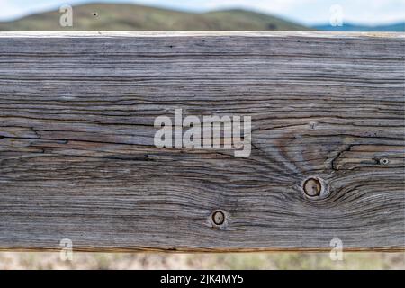 Detail of wood grain on the back board of a park bench Stock Photo