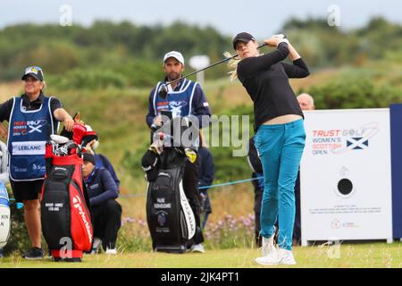 Irvine, UK. 30th July, 2022. The third round of the Trust Golf Women's Scottish Golf took place with 75 players making the cut. Heavy overnight rain from Friday into Saturday made for a softer and more testing course. Maude-Aimee Leblanc teeing off at the 5th. Credit: Findlay/Alamy Live News Stock Photo