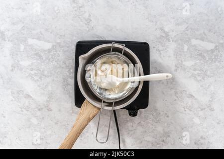 Double boiler hi-res stock photography and images - Alamy