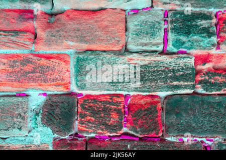 Vibrant colored bricks background . Old stone wall texture Stock Photo