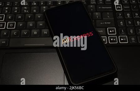 aliexpress logo on mobile phone , background is a keyboard  , Sydney Australia July 30 2022 Stock Photo