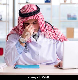Arab doctor working in the clinic Stock Photo