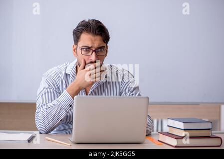 Young teacher in telestudy concept Stock Photo