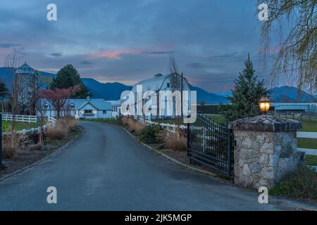 Rural farm buildings at dusk near chilliwack, British Columbia, Canada. Stock Photo