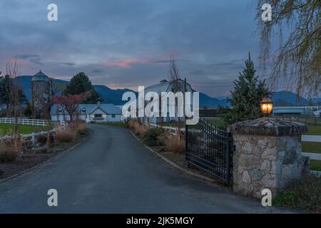 Rural farm buildings at dusk near chilliwack, British Columbia, Canada. Stock Photo