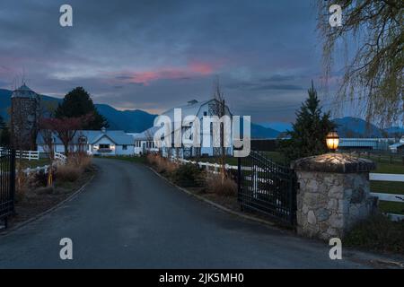 Rural farm buildings at dusk near chilliwack, British Columbia, Canada. Stock Photo