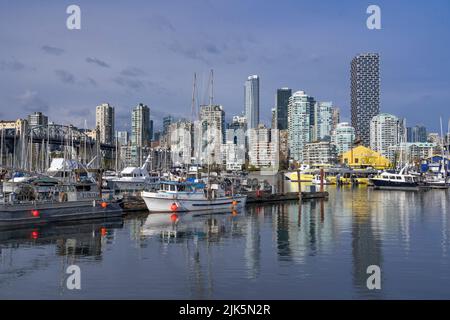 False Creek with reflections of boats and buildings in Vancouver, British Columbia, Canada. Stock Photo