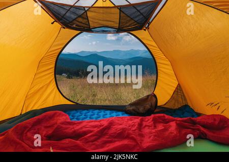 view from touristic tent to mountain valley Stock Photo