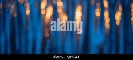 Defocused blue background with warm color bokeh lights Stock Photo