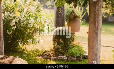 botijo in the sun on a white background Stock Photo