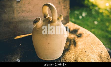 botijo in the sun on a white background Stock Photo