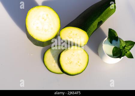 zucchini cut into halves Stock Photo