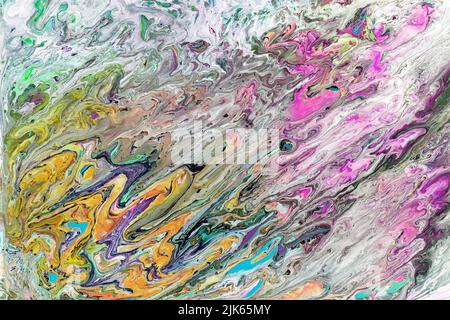 Marbled texture created with acrylic paint and watercolors mixed with water forming organic, rounded and sinuous structures perfect for backgrounds an Stock Photo