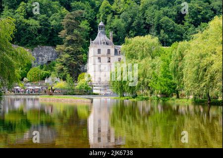 View of the Dronne river boardering the town hall (Mairie) of Brantôme en Périgord in the former abbey of Saint-Pierre, France Stock Photo