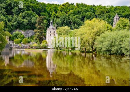 View of the Dronne river boardering the town hall (Mairie) of Brantôme en Périgord in the former abbey of Saint-Pierre, France Stock Photo