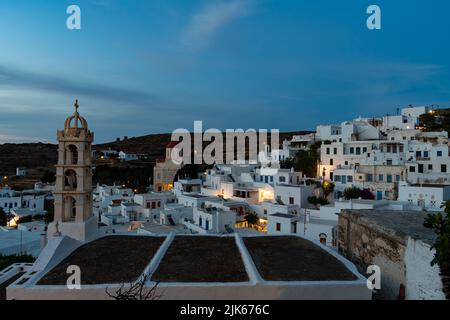 Panoramic night view of Pyrgos (Panormos) village in Tinos island, Greece Stock Photo