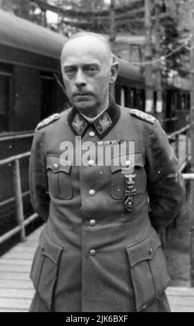 The Nazi German elite troops the Waffen-SS had many divisions of foreign volunteers who believed in nazism. . SS-Obergruppenführer Karl Pfeffer-Wildenbruch was commander of the IX Waffen Mountain Corps of the SS (Croatian)  later simply IX SS Mountain Corps, was a German Waffen-SS alpine corps during World War II. Originally set up to control Croatian and Albanian SS divisions, it also commanded a variety of other German and Hungarian units of the Waffen SS Stock Photo