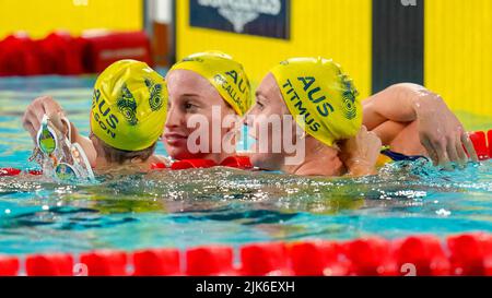Ariame TITMUS (AUS) (right) celebrates with Silver medal winner Mollie O’CALLAGHAN (AUS) (centre) and Bronze Medal winner Madison WILSON (AUS) (left) after she wins Gold in the Women's 200m Freestyle Final at Sandwell Aquatics Centre, Smethwick, England on the 29 July 2022. Photo by David Horn. Stock Photo