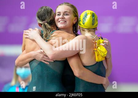Ariame TITMUS (AUS) (centre) celebrates with Silver medal winner Mollie O’CALLAGHAN (AUS) (right) and Bronze Medal winner Madison WILSON (AUS) (left) after she wins Gold in the Women's 200m Freestyle Final at Sandwell Aquatics Centre, Smethwick, England on the 29 July 2022. Photo by David Horn. Stock Photo