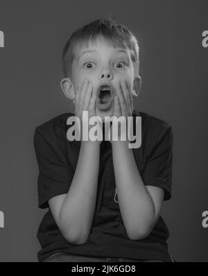 Young boy in studio pose Stock Photo