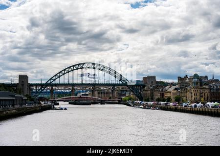 NEWCASTLE UPON TYNE, ENGLAND - JULY 3rd, 2022:Tyne Bridge, a steel bridge over the River Tyne in North East England, linking Newcastle upon Tyne and G Stock Photo