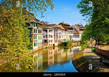 Ill navigation canal and Quai de la Petite-France in Strasbourg city, Alsace,  France. Located in the historic and tourist district of Petite France Stock Photo