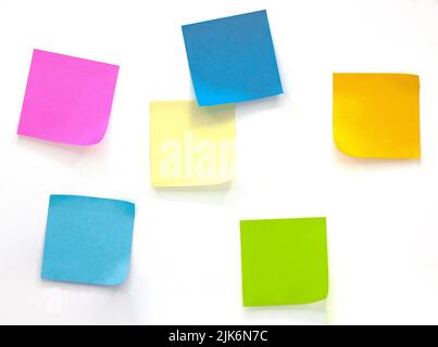 Collection of different colored sheets of note papers Isolated on white background Stock Photo