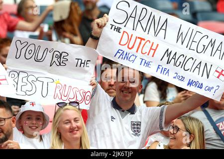 England fans hold up signs for England head coach Sarina Wiegman and Alessia Russo before the UEFA Women's Euro 2022 final at Wembley Stadium, London. Picture date: Sunday July 31, 2022.