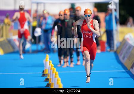 England's Georgia Taylor-Brown on their way to gold in the mixed relay Triathlon on day three of the 2022 Commonwealth Games in Birmingham. Picture date: Sunday July 31, 2022. Stock Photo