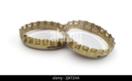 Metal caps for beer bottles isolated on white. Stock Photo