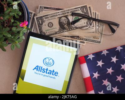 In this photo illustration, Allstate Insurance Company logo seen displayed on a tablet Stock Photo