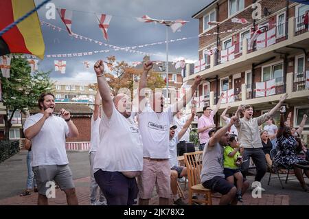 London, UK. 31st July, 2022. UEFA Womens EURO 2022: England vs Germany. Residents of the Kirby estate in Bermondsey celebrate England first goal during the match final. Credit: Guy Corbishley/Alamy Live News Stock Photo