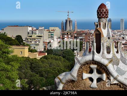 Close-up of the stone built Casa del Guarda. The mosaic-covered roof & mushroom-shaped dome look like something from a fairytale, Park Güell, Barcelona. Stock Photo