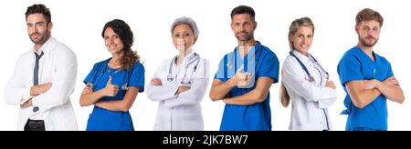 Successful group of doctors standing with arms crossed or giving thumbs up in a row isolated on white background Stock Photo