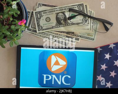 In this photo illustration, the PNC Financial Services (PNC Bank) logo ...