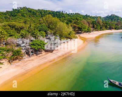 Old wooden pirate boat on the beach in Koh Phayam, Ranong, Thailand Stock Photo