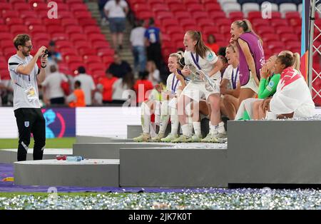 England's Keira Walsh has her photo taken as she celebrates with the trophy after England win the UEFA Women's Euro 2022 final at Wembley Stadium, London. Picture date: Sunday July 31, 2022. Stock Photo