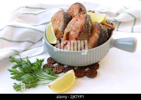 River fish fried in a frying pan Stock Photo - Alamy