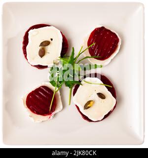 Milfey of beetroot with goat cheese Stock Photo