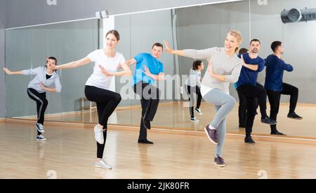 People practicing vigorous dance Stock Photo