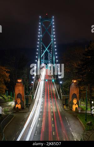 The Lions Gate Bridge illuminated at night in Vancouver, British Columbia, Canada. Stock Photo