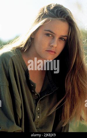 Alicia Silverstone Film: The Crush (1993) Characters: Adrienne Forrester  Director: Alan Shapiro 02 April 1993   **WARNING** This Photograph is for editorial use only and is the copyright of MORGAN CREEK PRODUCTIONS and/or the Photographer assigned by the Film or Production Company and can only be reproduced by publications in conjunction with the promotion of the above Film. A Mandatory Credit To MORGAN CREEK PRODUCTIONS is required. The Photographer should also be credited when known. No commercial use can be granted without written authority from the Film Company. Stock Photo