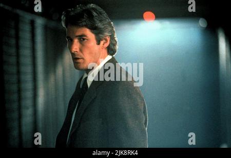 Richard Gere Film: Final Analysis (1992) Characters: Dr. Isaac Barr  Director: Phil Joanou 07 February 1992   **WARNING** This Photograph is for editorial use only and is the copyright of WARNER BROS and/or the Photographer assigned by the Film or Production Company and can only be reproduced by publications in conjunction with the promotion of the above Film. A Mandatory Credit To WARNER BROS is required. The Photographer should also be credited when known. No commercial use can be granted without written authority from the Film Company. Stock Photo