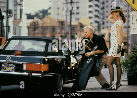 Steve Martin & Marilu Henner  Film L.A. Story (1991) Characters: Harris K. Telemacher & Trudi  Director: Mick Jackson 08 February 1991   **WARNING** This Photograph is for editorial use only and is the copyright of TRISTAR and/or the Photographer assigned by the  Film or Production Company and can only be reproduced by publications in conjunction with the promotion of the above  Film. A Mandatory Credit To TRISTAR is required. The Photographer should also be credited when known. No commercial use can be granted without written authority from the  Film Company. Stock Photo