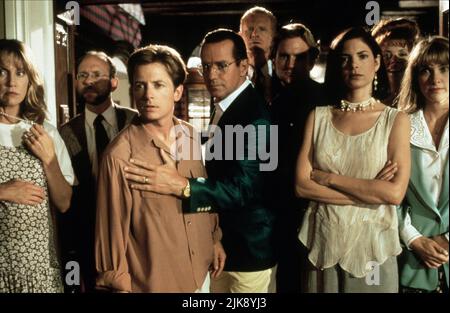 Mary Ellen Trainor, Bob Balaban, Michael J. Fox, Phil Hartman, Ed Begley Jr., Jere Burns, Joyce Hyser, Siobhan Fallon & Colleen Camp Film: Greedy (1994) Characters: Nora McTeague, Ed, Daniel McTeague, Frank, Carl McTeague, Glen, Muriel, Tina, Patti  Director: Jonathan Lynn 04 March 1994   **WARNING** This Photograph is for editorial use only and is the copyright of UNIVERSAL and/or the Photographer assigned by the Film or Production Company and can only be reproduced by publications in conjunction with the promotion of the above Film. A Mandatory Credit To UNIVERSAL is required. The Photograph Stock Photo