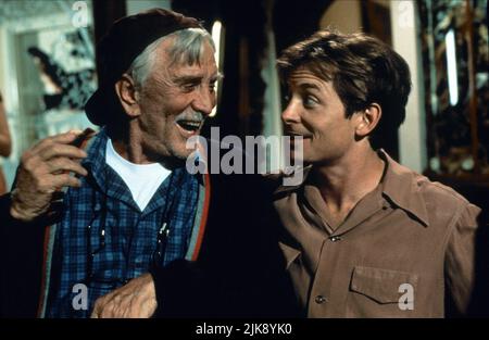 Kirk Douglas & Michael J. Fox Film: Greedy (1994) Characters: Uncle Joe McTeague, Daniel McTeague  Director: Jonathan Lynn 04 March 1994   **WARNING** This Photograph is for editorial use only and is the copyright of UNIVERSAL and/or the Photographer assigned by the Film or Production Company and can only be reproduced by publications in conjunction with the promotion of the above Film. A Mandatory Credit To UNIVERSAL is required. The Photographer should also be credited when known. No commercial use can be granted without written authority from the Film Company. Stock Photo